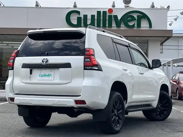 トヨタ ランドクルーザー プラド TX Lパッケージ マットブラED 三重県 2024(令6)年 1.5万km ホワイトパールクリスタルシャイン ♪ワンオーナー/♪走行14895km/♪車検 令和9年1月4日迄/♪4WD/ディーゼル/ターボ/♪サンルーフ/ベージュ革シート/前席パワーシート/前席シートヒーター/エアシート/電動格納サードシート/ダウンヒルアシストコントロール/プリクラッシュセーフティ/レーンディパーチャーアラート/ロードサインアシスト/先行車発進告知/レーダークルーズコントロール/パーキングサポートブレーキ/クリアランスソナー/オートマチックハイビーム/スマートキー×2/プッシュスタート/アルパイン9インチナビ/・HDMI・USB/・フルセグ・SD録音/・DVD再生/・Bluetoothオーディオ/・バックカメラ/ドライブレコーダー/2nd START/純正18インチAW/LEDヘッドライト/LEDフォグライト/オートライト/オートワイパー/ウィンカーミラー/オートリトラクタブルミラー/ルーフレール/サイドステップ/ウッドパネル/ウッドコンビステアリング/ステアリングスイッチ/スモークフィルム/ラバーマット/ドアバイザー/ETC/サイド/カーテン/ニーエアバック
