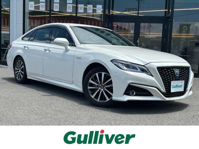 トヨタ クラウン ハイブリッド G 兵庫県 2020(令2)年 7.5万km ホワイトパールクリスタルシャイン 純正8型ナビ/・BT.TV.AM.FMアラウンドビューモニター/プリクラッシュセーフティー/ブラインドスポットモニター/クリアランスソナー/リアクロストラフィックアラート/パーキングサポートブレーキ/ヘッドアップディスプレイ/レーダークルーズコントロール/ロードサインアシスト/先行車発信告知/電動パーキングブレーキ/オートオールド/前席シートヒーター/ハンドルヒーター/パワーシート（メモリー付き）/デジタルインナーミラー/ビルトインETC2.0/前方ドラレコ/純正フロアマット