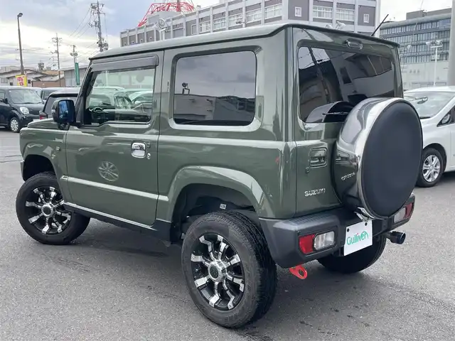 スズキ ジムニー XC 島根県 2020(令2)年 3.6万km ジャングルグリーン 純正８インチナビ　/フルセグＴＶ　/ＤＶＤ再生　/Ｂｌｕｅｔｏｏｔｈオーディオ/前方ドライブレコーダー　/ＥＴＣ　/社外レーダー（セルスター）/社外マフラー（ロッソモデロ）/社外牽引フック（モンスタースポーツ）/社外デイライト/社外16インチアルミホイール/リアスモークフィルム　/ダウンヒルアシストコントロール/前席シートヒーター/ミラーヒーター/ヘッドライトウォッシャー/純正LEDヘッドライト/背面タイヤ（ハードカバー付）/スマートキー　/プッシュスタート/保証書・取説・スペアキー1本