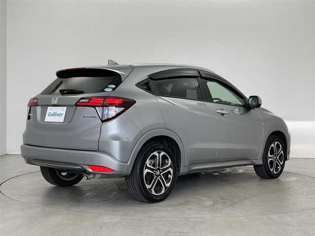 ホンダ ヴェゼル ハイブリッド Z 埼玉県 2014(平26)年 5.7万km ティンテッドシルバーM アクティブシティブレーキシステム/革シート/前席シートヒーター/純正メモリナビ・フルセグTV/　CD/DVD/SD/USB/Bluetooth/バックカメラ/クルーズコントロール/パドルシフト/LEDヘッドライト/プッシュスタート/スマートキー/ビルトインETC