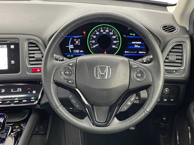 ホンダ ヴェゼル ハイブリッド Z 埼玉県 2014(平26)年 5.7万km ティンテッドシルバーM アクティブシティブレーキシステム/革シート/前席シートヒーター/純正メモリナビ・フルセグTV/　CD/DVD/SD/USB/Bluetooth/バックカメラ/クルーズコントロール/パドルシフト/LEDヘッドライト/プッシュスタート/スマートキー/ビルトインETC