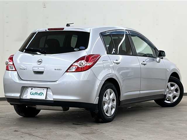 日産 ティーダ 15M FOUR 道央・札幌 2010(平22)年 12.3万km ブリリアントシルバー /純正ナビ(HS309-A)//ワンセグテレビ//純正オーディオ//DVD再生あり//CD//バックカメラ//ETC//ハーフレザーシート//オートエアコン//パワーウィンドウ//パワーステアリング//4WD//ABS//駆動切り替え//純正フロアマット//ダブルエアバック//純正キセノンヘッドライト