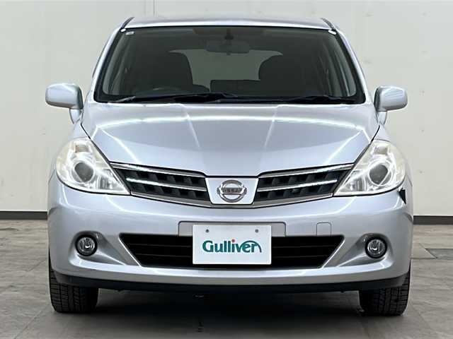 日産 ティーダ 15M FOUR 道央・札幌 2010(平22)年 12.3万km ブリリアントシルバー /純正ナビ(HS309-A)//ワンセグテレビ//純正オーディオ//DVD再生あり//CD//バックカメラ//ETC//ハーフレザーシート//オートエアコン//パワーウィンドウ//パワーステアリング//4WD//ABS//駆動切り替え//純正フロアマット//ダブルエアバック//純正キセノンヘッドライト