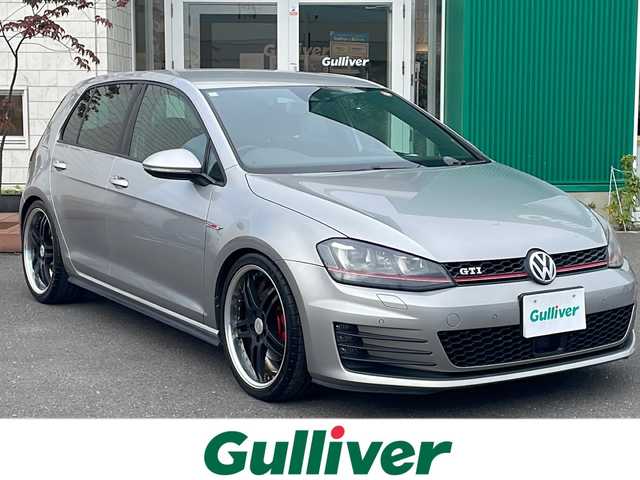 フォルクスワーゲン ゴルフ ＧＴＩ 青森県 2014(平26)年 6万km タングステンシルバーメタリック ターボ/OP純正8インチディスプレイナビ・フルセグTV/CD・DVD・Bluetooth・SD/プリクラッシュブレーキ/アダプティブクルーズコントロール/ブラインドスポットディテクション/レーンキープアシスト/パークディスタンスコントロール/パドルシフト/前後ドライブレコーダー/ビルトインETC/HIDヘッドライト/LEDフォグランプ/社外19インチアルミ/社外車高調/スペアキー/保証書・取扱書