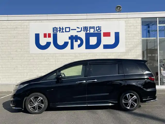 ホンダ オデッセイ アブソルートXホンダセンシングアドバンP 佐賀県 2016(平28)年 14.3万km クリスタルブラックパール （株)IDOMが運営する【じしゃロン佐賀店】の自社ローン専用車両になります。/こちらは現金またはオートローンご利用時の価格です。自社ローンご希望の方は別途その旨お申付け下さい/禁煙車　/８人乗り　/ブラック　/全周囲カメラ　/純正ナビ フルセグ ＢＴオーディオ　/ＥＴＣ　/両側電動スライドドア
