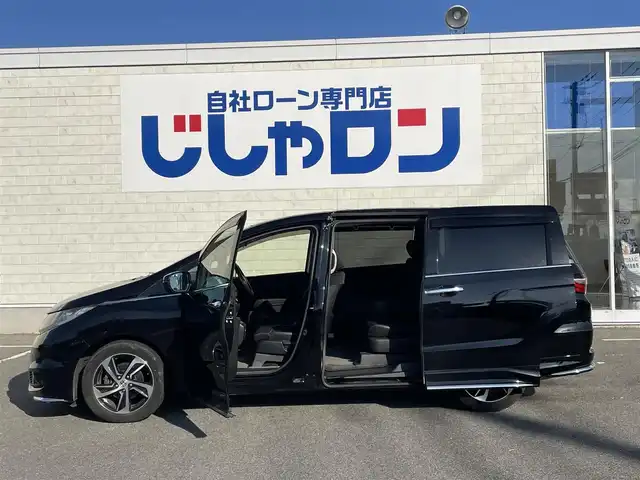 ホンダ オデッセイ アブソルートXホンダセンシングアドバンP 佐賀県 2016(平28)年 14.3万km クリスタルブラックパール （株)IDOMが運営する【じしゃロン佐賀店】の自社ローン専用車両になります。/こちらは現金またはオートローンご利用時の価格です。自社ローンご希望の方は別途その旨お申付け下さい/禁煙車　/８人乗り　/ブラック　/全周囲カメラ　/純正ナビ フルセグ ＢＴオーディオ　/ＥＴＣ　/両側電動スライドドア