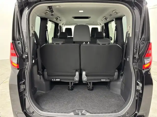 トヨタ ノア ハイブリッド G 福岡県 2024(令6)年 2.5万km アティチュードブラックマイカ 純正１０．５型ＤＡナビ/フルセグTV　/全方位カメラ　/ビルトインＥＴＣ２．０　/前後ドラレコ　/レーダークルコン　/コーナーセンサー　/トヨタセーフティセンス　/衝突軽減ブレーキ　/レーンキープ　/アクセル踏み間違い防止　/パーキングアシスト　/片側電動スライドドア　/純正１６インチＡＷ　/ＬＥＤヘッドライト