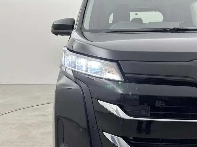 トヨタ ノア ハイブリッド G 福岡県 2024(令6)年 2.5万km アティチュードブラックマイカ 純正１０．５型ＤＡナビ/フルセグTV　/全方位カメラ　/ビルトインＥＴＣ２．０　/前後ドラレコ　/レーダークルコン　/コーナーセンサー　/トヨタセーフティセンス　/衝突軽減ブレーキ　/レーンキープ　/アクセル踏み間違い防止　/パーキングアシスト　/片側電動スライドドア　/純正１６インチＡＷ　/ＬＥＤヘッドライト