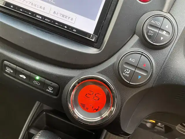 ホンダ フィット RS 10thアニバーサリー 道央・札幌 2012(平24)年 6.4万km サンセットオレンジⅡ ・パドルシフト/・寒冷地仕様/・フォグランプ/・ビルトインETC/・電動格納ミラー/・無限ミラーカバー/・無限ドアバイザー/・バニティーミラー/・フルフラットシート/・スペアキー/・ウィンカーミラー/・HIDヘッドライト/・積込夏タイヤ/・積込ワイパー