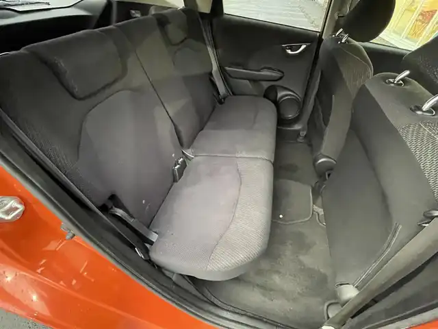 ホンダ フィット RS 10thアニバーサリー 道央・札幌 2012(平24)年 6.4万km サンセットオレンジⅡ ・パドルシフト/・寒冷地仕様/・フォグランプ/・ビルトインETC/・電動格納ミラー/・無限ミラーカバー/・無限ドアバイザー/・バニティーミラー/・フルフラットシート/・スペアキー/・ウィンカーミラー/・HIDヘッドライト/・積込夏タイヤ/・積込ワイパー