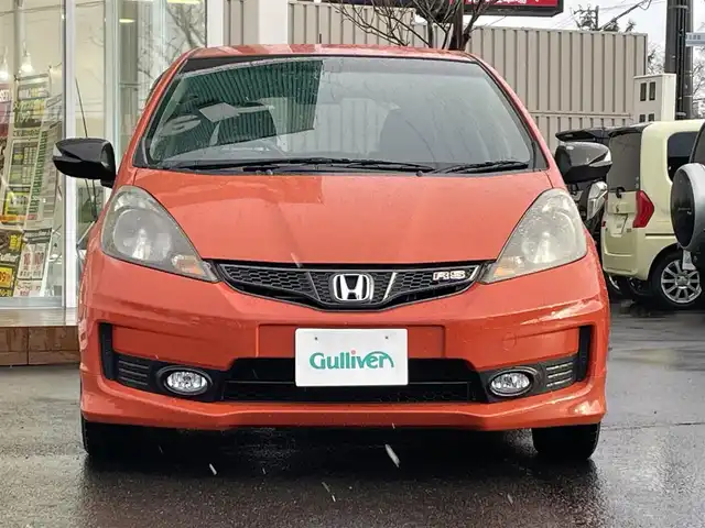 ホンダ フィット RS 10thアニバーサリー 道央・札幌 2012(平24)年 6.4万km サンセットオレンジⅡ ・パドルシフト/・寒冷地仕様/・フォグランプ/・ビルトインETC/・電動格納ミラー/・無限ミラーカバー/・無限ドアバイザー/・バニティーミラー/・フルフラットシート/・スペアキー/・ウィンカーミラー/・HIDヘッドライト/・積込夏タイヤ/・積込ワイパー
