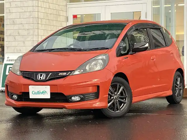 ホンダ フィット RS 10thアニバーサリー 道央・札幌 2012(平24)年 6.4万km サンセットオレンジⅡ ・パドルシフト/・寒冷地仕様/・フォグランプ/・ビルトインETC/・電動格納ミラー/・無限ミラーカバー/・無限ドアバイザー/・バニティーミラー/・フルフラットシート/・スペアキー/・ウィンカーミラー/・HIDヘッドライト/・積込夏タイヤ/・積込ワイパー