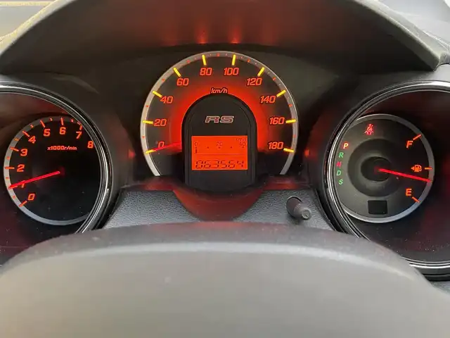 ホンダ フィット RS 10thアニバーサリー 道央・札幌 2012(平24)年 6.4万km サンセットオレンジⅡ ・パドルシフト/・寒冷地仕様/・フォグランプ/・ビルトインETC/・電動格納ミラー/・無限ミラーカバー/・無限ドアバイザー/・バニティーミラー/・フルフラットシート/・スペアキー/・ウィンカーミラー/・HIDヘッドライト/・積込夏タイヤ/・積込ワイパー