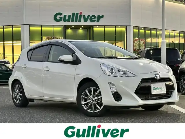 トヨタ アクア S 島根県 2015(平27)年 4.8万km ライムホワイトパールクリスタルシャイン 登録時走行距離　47168km/ワンオーナー/取扱説明書/保証書/純正ナビ(NSCP-W64)/(地上TV/Bluetooth/AM/FM/CD/SD)/バックカメラ/ウィンカーミラー/フォグランプ/スマートキー/スペアキー/純正フロアマット/横滑り防止装置/ビルドインETC/社外アルミ１５インチ/禁煙車