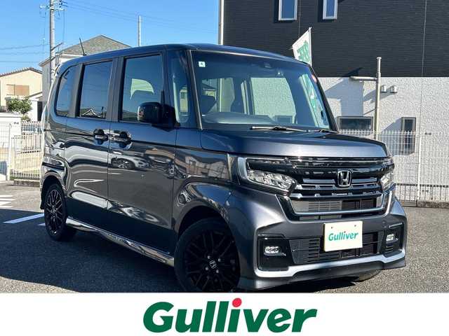 ホンダ Ｎ ＢＯＸ カスタム L ターボ スタイル+ブラック 三重県 2022(令4)年 4.3万km メテオロイドグレーメタリック 登録時42718km/ワンオーナー/禁煙車/純正７インチディスプレイオーディオ（WX-211C）/・Ｂｌｕｅｔｏｏｔｈ・ワンセグ・AM/FM・CD・USB/衝突軽減ブレーキ/レーンキープアシスト/先行車発進お知らせ機能/レーダークルーズコントロール/ロードサインアシスト/前後ドラレコ/両側パワースライドドア/バックカメラ/ＵＳＢ接続・充電/黒ハーフレザーシート/ETC/パドルシフト/電動パーキングブレーキ/ブレーキホールド/LEDヘッドライト