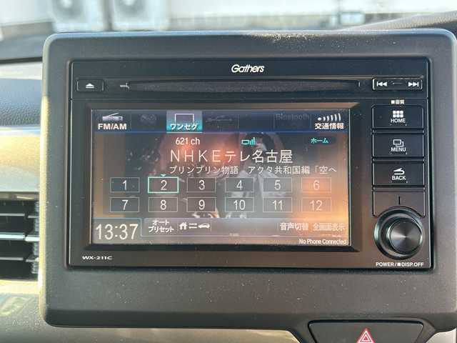 ホンダ Ｎ ＢＯＸ カスタム L ターボ スタイル+ブラック 三重県 2022(令4)年 4.3万km メテオロイドグレーメタリック 登録時42718km/ワンオーナー/禁煙車/純正７インチディスプレイオーディオ（WX-211C）/・Ｂｌｕｅｔｏｏｔｈ・ワンセグ・AM/FM・CD・USB/衝突軽減ブレーキ/レーンキープアシスト/先行車発進お知らせ機能/レーダークルーズコントロール/ロードサインアシスト/前後ドラレコ/両側パワースライドドア/バックカメラ/ＵＳＢ接続・充電/黒ハーフレザーシート/ETC/パドルシフト/電動パーキングブレーキ/ブレーキホールド/LEDヘッドライト