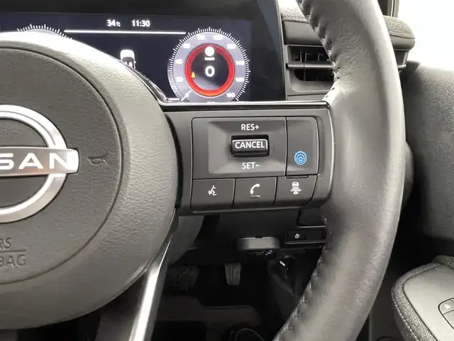 日産 オーラ G レザーエディション 熊本県 2022(令4)年 2.1万km ピュアホワイトパール / スーパーブラック 2トーン 純正ナビ（ＢＴ・フルセグ・ＵＳＢ）/全周囲カメラ　/ビルトインＥＴＣ２．０　/純正前方ドライブレコーダー　/レーダークルーズコントロール/BOSEサウンド/前後クリアランスソナー　/前席シートヒーター　/プロパイロット　/インテリジェントエマージェンシーブレーキ/標識認識機能/踏み間違い衝突防止アシスト/ふらつき警報機能/前方衝突予測警報/車線逸脱警報/ブラインドスポットモニター/ヒルスタートアシスト/横滑り防止/オートライト/オートマチックハイビーム/LEDヘッドライト/フォグライト/スマートキー/プッシュスタート/スペアキー1本