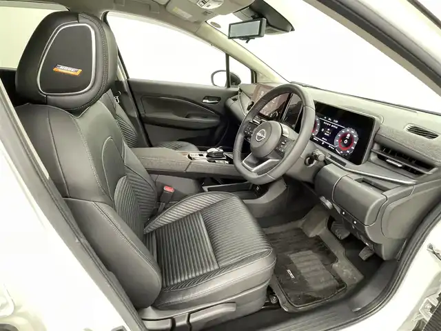 日産 オーラ G レザーエディション 熊本県 2022(令4)年 2.1万km ピュアホワイトパール / スーパーブラック 2トーン 純正ナビ（ＢＴ・フルセグ・ＵＳＢ）/全周囲カメラ　/ビルトインＥＴＣ２．０　/純正前方ドライブレコーダー　/レーダークルーズコントロール/BOSEサウンド/前後クリアランスソナー　/前席シートヒーター　/プロパイロット　/インテリジェントエマージェンシーブレーキ/標識認識機能/踏み間違い衝突防止アシスト/ふらつき警報機能/前方衝突予測警報/車線逸脱警報/ブラインドスポットモニター/ヒルスタートアシスト/横滑り防止/オートライト/オートマチックハイビーム/LEDヘッドライト/フォグライト/スマートキー/プッシュスタート/スペアキー1本