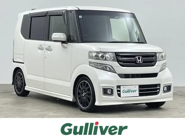 ホンダ Ｎ ＢＯＸ カスタム ターボ SSブラックSパッケージ 千葉県 2017(平29)年 8万km プレミアムホワイトパールⅡ 禁煙/純正8型ナビ VXM-175VFEi/Bluetooth/フルセグTV/CD/DVD/SD/USB/AppleCarplay/バックモニター/パドルシフト/クルーズコントロール/オートヘッドライト/両側パワースライドドア/ベンチシート/フルフラット/チップアップシート/ハーフレザーシート/D/N席シートヒーター/純正アルミホイール