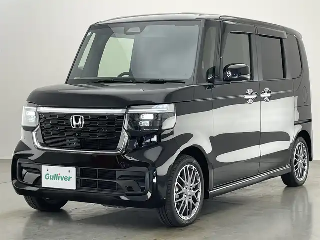 ホンダ Ｎ ＢＯＸ カスタム ターボ 愛知県 2024(令6)年 0.8万km クリスタルブラックパール 純正８型ＤＡ　両側パワスラ　シートヒーター　パドルシフト　黒ハーフレザーシート　衝突軽減　車線逸脱　LEDオートライト　オートハイビーム　コーナーセンサー　電子パーキング　アイドリングストップ　禁煙車　純正１５インチAW　カーテンエアバッグ　プッシュスタート　スマートキー