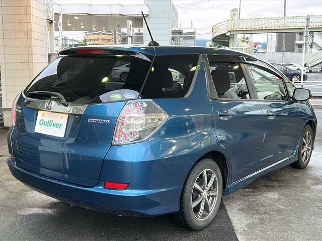 ホンダ フィット シャトル ハイブリッド スマートセレ 京都府 2012(平24)年 9.8万km ホライゾンターコイズパール 純正HDDナビ/ワンセグテレビ/バックカメラ/クルーズコントロール/スマートキー/ハーフレザーシート/ウィンカーミラー/ビルトインETC/ROZESTアルミホイール/横滑り防止装置/オートライトハイト/Wエアバック/CD/フルフラットシート/HDDミュージックサーバー/純正フロアマット/AACエアコン