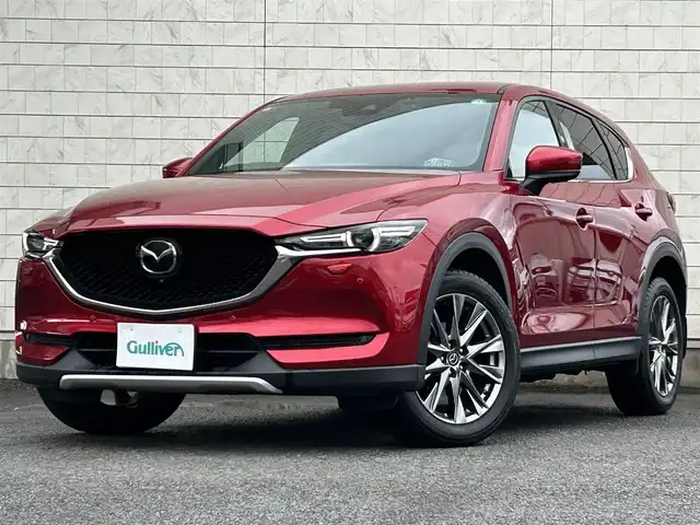 マツダ ＣＸ－５ XD エクスクルーシブモード 大分県 2019(令1)年 5.3万km ソウルレッドクリスタルM ワンオーナー/Boseサウンドシステム/純正ナビ/【フルセグTV/Bluetooth/DVD/CD/SD】/外部端子接続/【USB/AUX】/HUD/360°ビュー・モニター＋フロントパーキングセンサー/アドバンスト・スマート・シティ・ブレーキ・サポート/スマート・シティ・ブレーキ・サポート/リアパーキングセンサー/スマート・ブレーキ・サポート（SBS）＆マツダ・レーダー・クルーズ・コントロール/アダプティブ・LED・ヘッドライト（ALH）/レーンキープ・アシスト・システム（LAS）/車線逸脱警報システム（LDWS）/ブラインド・スポット・モニタリング（BSM）/ドライバー・アテンション・アラート（DAA）/ナッパレザーシート(ブラウン)/D席メモリーシート/DN席パワーシート/DN席シートヒーター/DN席エアシート/ステアリングヒーター/純正LEDヘッドライト/スマートキー2本/保証書/取扱説明書