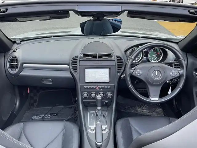 メルセデス・ベンツ ＳＬＫ２００ コンプレッサー 静岡県 2010(平22)年 2.6万km イリジウムシルバー 電動オープン/社外ナビ/フルセグTV/DVD/CD/BT/SD/MSV/黒革シート/前席シートヒーター/前席パワーシート/クルーズコントロール/HIDヘッドライト/ETC/ステアリングスイッチ/キーレス×2/純正16インチAW/保証書/取扱説明書/H25/27/R1/3/4/5点検記録簿有