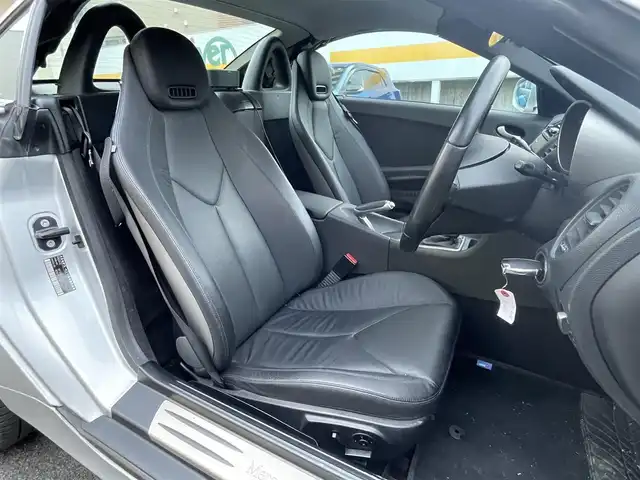 メルセデス・ベンツ ＳＬＫ２００ コンプレッサー 静岡県 2010(平22)年 2.6万km イリジウムシルバー 電動オープン/社外ナビ/フルセグTV/DVD/CD/BT/SD/MSV/黒革シート/前席シートヒーター/前席パワーシート/クルーズコントロール/HIDヘッドライト/ETC/ステアリングスイッチ/キーレス×2/純正16インチAW/保証書/取扱説明書/H25/27/R1/3/4/5点検記録簿有
