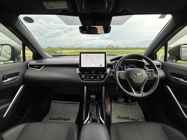 トヨタ カローラ クロス ハイブリッド Z 佐賀県 2024(令6)年 1.8万km アティチュードブラックマイカ ワンオーナー/純正10.5インチディスプレイ(ナビ機能付)/・フルセグTV/AM/FM/USB/Bluetooth/バックカメラ/前後ドライブレコーダー/ビルトインETC2.0/パワーバックドア(予約ロック機能付)/電子パーキングブレーキ/AUTO HOLD機能/TVキャンセラー/ハーフレザーシート/D席パワーシート/DN席シートヒーター/ISOFIX対応/革巻きステアリング/ステアリングリモコン/純正18インチアルミホイール/純正LEDヘッドライト/・オートマチックハイビーム/純正LEDフォグランプ/純正ドアバイザ―/新車保証書/取扱説明書/スペアキー１本/トヨタセーフティセンス/・レーダークルーズコントロール/・プリクラッシュセーフティ/・レーンデパーチャーアラート/・ブラインドスポットモニター/・クリアランスソナー
