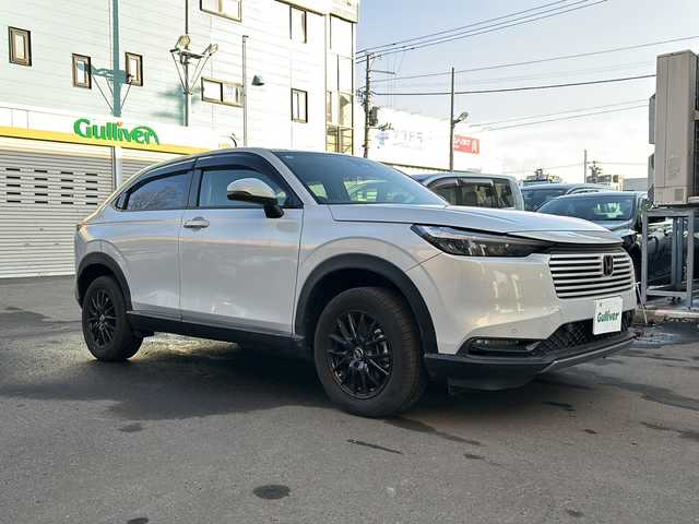 ホンダ ヴェゼル G 道央・札幌 2025(令7)年 0.6万km プレミアムサンライトホワイトパール 社外ディスプレイオーディオ/寒冷地仕様/クルーズコントロール（追従機能付き）/ドライブレコーダー/ETC/スペアキー/純正エンジンスターター/シートヒータ―前席