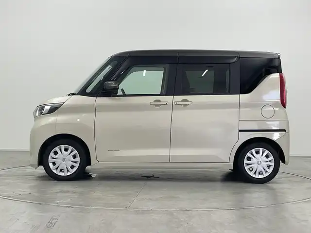 日産 ルークス X 群馬県 2021(令3)年 1.9万km フローズンバニラパール/アッシュブラウンM クリアランスソナー（F/R）　衝突被害軽減ブレーキ　レーンアシスト　純正９インチSDナビ（CD/DVD/SD/Bluetooth/フルセグTV）　アラウンドビューモニター　両側パワースライドドア（ハンズフリー）　アイドリングストップ　ステアリングスイッチ　オートライト　オートハイビーム　ハロゲン　ヘッドライトレベライザー　電動格納ミラー　ウィンカーミラー　純正フロアマット　純正バイザー　プッシュスタート　スマートキー　リアサンシェード（左右）　リアサーキュレーター