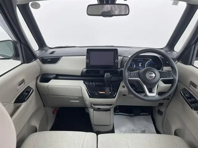 日産 ルークス X 群馬県 2021(令3)年 1.9万km フローズンバニラパール/アッシュブラウンM クリアランスソナー（F/R）　衝突被害軽減ブレーキ　レーンアシスト　純正９インチSDナビ（CD/DVD/SD/Bluetooth/フルセグTV）　アラウンドビューモニター　両側パワースライドドア（ハンズフリー）　アイドリングストップ　ステアリングスイッチ　オートライト　オートハイビーム　ハロゲン　ヘッドライトレベライザー　電動格納ミラー　ウィンカーミラー　純正フロアマット　純正バイザー　プッシュスタート　スマートキー　リアサンシェード（左右）　リアサーキュレーター