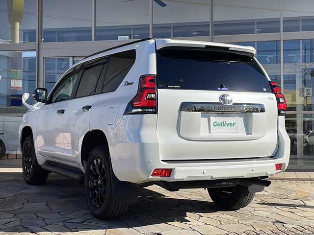 トヨタ ランドクルーザー プラド TX-L 70thアニバーサリーLTD 静岡県 2022(令4)年 2.3万km ホワイトパールクリスタルシャイン アルパインナビ/・フルセグTV/・FM/AM/・CD/DVD/・Bluetooth/・SD/・USB/・HDMI/・Apple Car Play/・Android Auto/主要装備/・サンルーフ/・ＥＴＣ/・茶革シート/・バックカメラ/・追従機能付クルコン/・オートハイビーム/・サイドカーテンエアバッグ/・前席パワーシート/・前席シートヒーター＆ベンチレーション/・ＭＴモード付ＡＴ/・プリクラッシュセーフティ/・クリアランスソナー/・車線逸脱警報