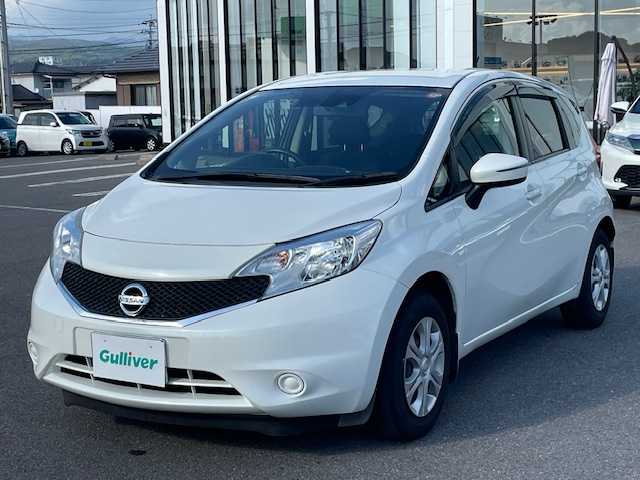 日産 ノート X 長崎県 2016(平28)年 3.8万km ブリリアントホワイトパール プッシュスタート/社外SDナビ/CD/DVD/ワンセグTV/エマージェンシーブレーキ/ドライブレコーダー/ウィンカーミラー/キセノンライト/スマートキー×2/ETC