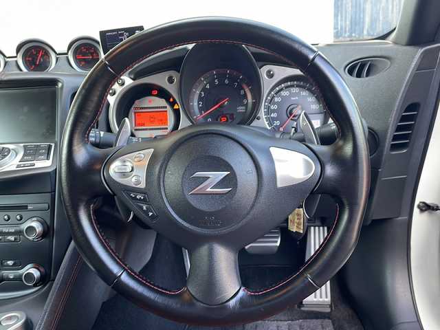 日産 フェアレディ Ｚ 40thアニバーサリー 長野県 2010(平22)年 5.4万km ブリリアントホワイトパール 純正メーカーHDDナビ/CD/ DVD/HDD/フルセグTV/バックカメラ/ハーフレザーシート/ビルドインETC/純正19インチアルミホイール/プッシュスタート/スマートキー/パワーシート/シートヒーター/オートライト/レーダー/純正フロアマット/取扱説明書/保証書/スペアキー
