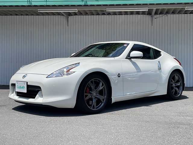 日産 フェアレディ Ｚ 40thアニバーサリー 長野県 2010(平22)年 5.4万km ブリリアントホワイトパール 純正メーカーHDDナビ/CD/ DVD/HDD/フルセグTV/バックカメラ/ハーフレザーシート/ビルドインETC/純正19インチアルミホイール/プッシュスタート/スマートキー/パワーシート/シートヒーター/オートライト/レーダー/純正フロアマット/取扱説明書/保証書/スペアキー