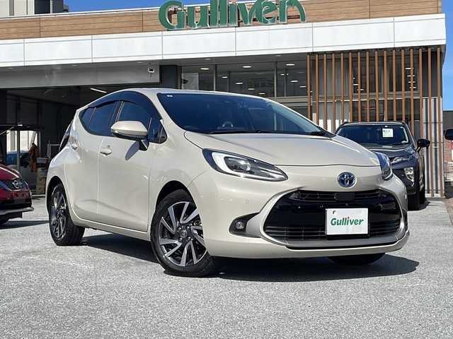 トヨタ アクア Z 沖縄県 2021(令3)年 7.1万km クリアベージュメタリック 純正ディスプレイオーディオ（Bluetooth・TV）/バックカメラ/ETC/シートヒーター/パワーシート/ドライブレコーダー/コーナーセンサー/衝突軽減システム/オートライト/BSM/革巻きステアリング/ステアリングスイッチ/電動格納ミラー/LEDヘッドライト