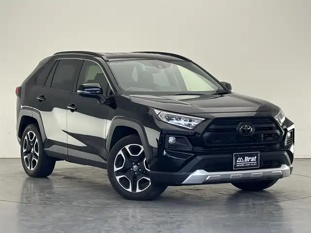 トヨタ ＲＡＶ４ アドベンチャー 長野県 2019(令1)年 3.9万km アティチュードブラックマイカ ・4WD/・純正ナビ/・バックカメラ/・ビルトインETC/・ユピテル前後ドラレコ/・デジタルインナーミラー/・フルセグTV/・Bluetooth/・追従機能付クルコン/・19インチアルミホイール/・衝突被害軽減システム/・横滑り防止機能/・電動パーキングブレーキ/・オートホールド機能/・ダウンヒルアシスト/・オートマチックハイビーム/・ステアリングヒーター/・ステアリングスイッチ/・革巻ステアリング/・前席シートヒーター・シートエアコン/・運転席パワーシート/・スマートキー/・プッシュスタート/・スペアキー/・取扱説明書/・保証書