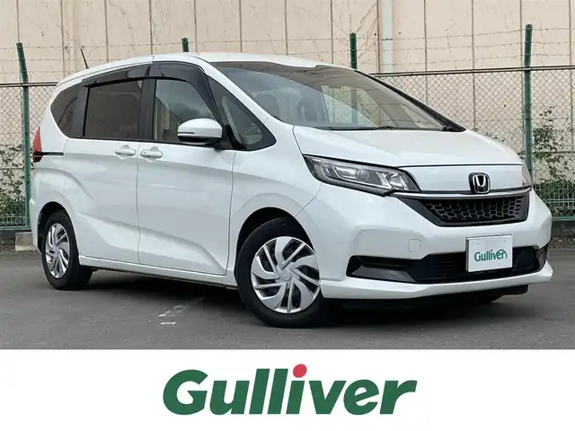 ホンダ フリード G ホンダセンシング 東京都 2021(令3)年 3.4万km プラチナホワイトパール ホンダセンシング/・CMBS/・歩行者事故低減ステアリング/・ACC/・LKAS/・誤発信抑制機能/両側パワースライドドア/ナビ装着スペシャルパッケージ/・ホンダGathersナビ/・CD/DVD/BT/FM/AM/TV/・ステアリングスイッチ/・ワイドリアカメラ/・地デジTV/・USB端子/LEDオートヘッドランプ/コーナーセンサー/プッシュスタート