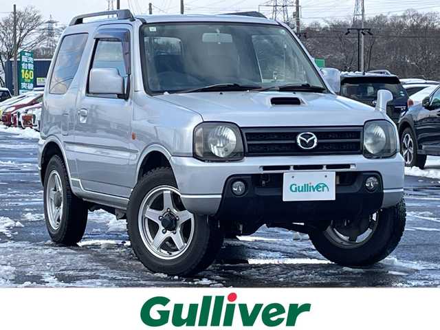 マツダ ＡＺ オフロード XC 道央・札幌 2011(平23)年 9.9万km シルキーシルバーメタリック ４WD/社外メモリーナビ/CD/DVD/BT/フルセグ/ETC/トランスファー切替/シートカバー/リモコンキー/ハロゲンヘッドライト/フォグランプ/電動格納ミラー/ドアバイザー/社外AW付夏タイヤ積込/175/80/R16/2019年/山3mm