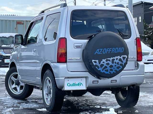 マツダ ＡＺ オフロード XC 道央・札幌 2011(平23)年 9.9万km シルキーシルバーメタリック ４WD/社外メモリーナビ/CD/DVD/BT/フルセグ/ETC/トランスファー切替/シートカバー/リモコンキー/ハロゲンヘッドライト/フォグランプ/電動格納ミラー/ドアバイザー/社外AW付夏タイヤ積込/175/80/R16/2019年/山3mm