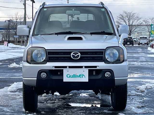 マツダ ＡＺ オフロード XC 道央・札幌 2011(平23)年 9.9万km シルキーシルバーメタリック ４WD/社外メモリーナビ/CD/DVD/BT/フルセグ/ETC/トランスファー切替/シートカバー/リモコンキー/ハロゲンヘッドライト/フォグランプ/電動格納ミラー/ドアバイザー/社外AW付夏タイヤ積込/175/80/R16/2019年/山3mm