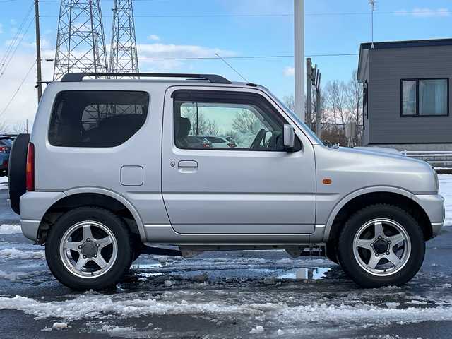 マツダ ＡＺ オフロード XC 道央・札幌 2011(平23)年 9.9万km シルキーシルバーメタリック ４WD/社外メモリーナビ/CD/DVD/BT/フルセグ/ETC/トランスファー切替/シートカバー/リモコンキー/ハロゲンヘッドライト/フォグランプ/電動格納ミラー/ドアバイザー/社外AW付夏タイヤ積込/175/80/R16/2019年/山3mm