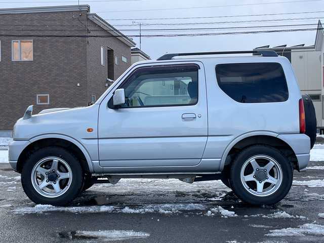 マツダ ＡＺ オフロード XC 道央・札幌 2011(平23)年 9.9万km シルキーシルバーメタリック ４WD/社外メモリーナビ/CD/DVD/BT/フルセグ/ETC/トランスファー切替/シートカバー/リモコンキー/ハロゲンヘッドライト/フォグランプ/電動格納ミラー/ドアバイザー/社外AW付夏タイヤ積込/175/80/R16/2019年/山3mm