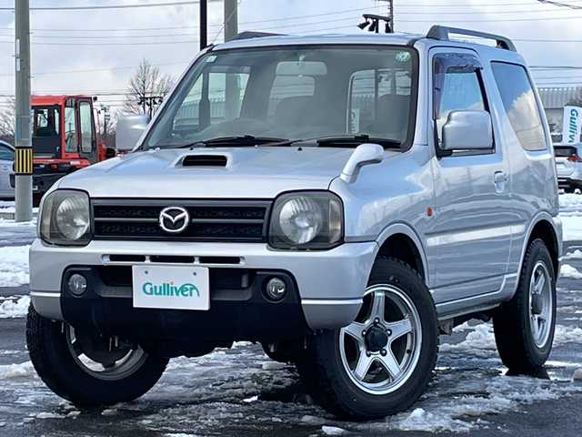 マツダ ＡＺ オフロード XC 道央・札幌 2011(平23)年 9.9万km シルキーシルバーメタリック ４WD/社外メモリーナビ/CD/DVD/BT/フルセグ/ETC/トランスファー切替/シートカバー/リモコンキー/ハロゲンヘッドライト/フォグランプ/電動格納ミラー/ドアバイザー/社外AW付夏タイヤ積込/175/80/R16/2019年/山3mm
