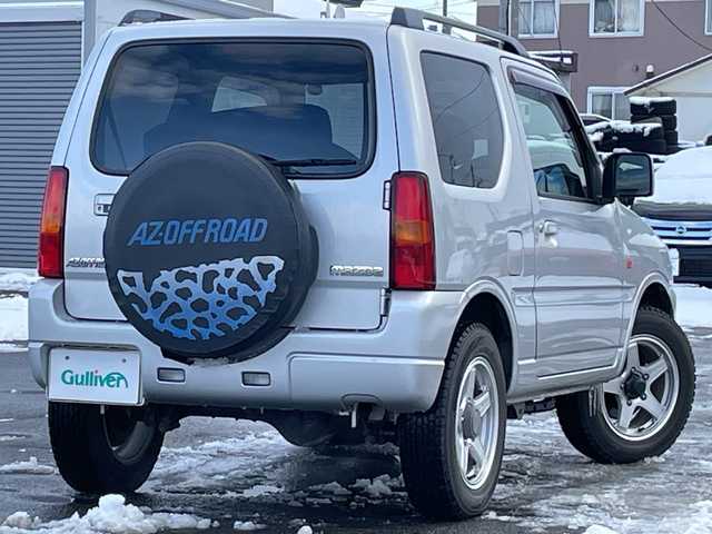 マツダ ＡＺ オフロード XC 道央・札幌 2011(平23)年 9.9万km シルキーシルバーメタリック ４WD/社外メモリーナビ/CD/DVD/BT/フルセグ/ETC/トランスファー切替/シートカバー/リモコンキー/ハロゲンヘッドライト/フォグランプ/電動格納ミラー/ドアバイザー/社外AW付夏タイヤ積込/175/80/R16/2019年/山3mm