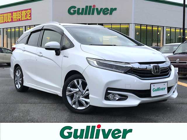 ホンダ シャトル ハイブリッド Z ホンダセンシング 鳥取県 2018(平30)年 8.9万km ホワイトオーキッドパール 純正ナビ/フルセグ/CD/DVD/BT/バックカメラ・ETC/ホンダセンシング/レーンキープアシスト/レーダークルーズコントロール/ハーフレザーシート/ドライブレコーダー/LEDヘットライト/フォグライト/純正16インチアルミホイール/パドルシフト/プッシュエンジンスタート/スペアキー/純正フロアマット/ドアバイザー/保証書・取扱説明書