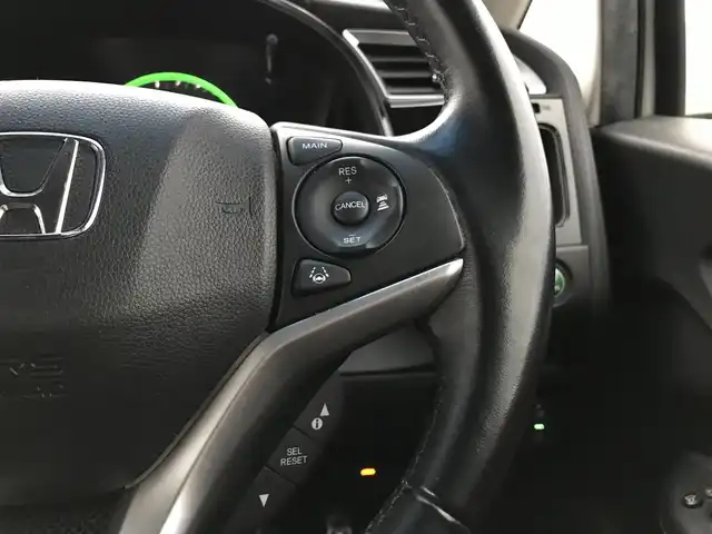 ホンダ シャトル ハイブリッド Z ホンダセンシング 鳥取県 2018(平30)年 8.9万km ホワイトオーキッドパール 純正ナビ/フルセグ/CD/DVD/BT/バックカメラ・ETC/ホンダセンシング/レーンキープアシスト/レーダークルーズコントロール/ハーフレザーシート/ドライブレコーダー/LEDヘットライト/フォグライト/純正16インチアルミホイール/パドルシフト/プッシュエンジンスタート/スペアキー/純正フロアマット/ドアバイザー/保証書・取扱説明書