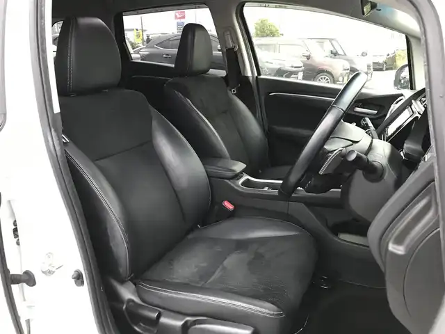 ホンダ シャトル ハイブリッド Z ホンダセンシング 鳥取県 2018(平30)年 8.9万km ホワイトオーキッドパール 純正ナビ/フルセグ/CD/DVD/BT/バックカメラ・ETC/ホンダセンシング/レーンキープアシスト/レーダークルーズコントロール/ハーフレザーシート/ドライブレコーダー/LEDヘットライト/フォグライト/純正16インチアルミホイール/パドルシフト/プッシュエンジンスタート/スペアキー/純正フロアマット/ドアバイザー/保証書・取扱説明書