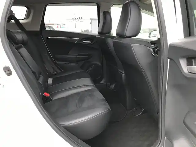 ホンダ シャトル ハイブリッド Z ホンダセンシング 鳥取県 2018(平30)年 8.9万km ホワイトオーキッドパール 純正ナビ/フルセグ/CD/DVD/BT/バックカメラ・ETC/ホンダセンシング/レーンキープアシスト/レーダークルーズコントロール/ハーフレザーシート/ドライブレコーダー/LEDヘットライト/フォグライト/純正16インチアルミホイール/パドルシフト/プッシュエンジンスタート/スペアキー/純正フロアマット/ドアバイザー/保証書・取扱説明書